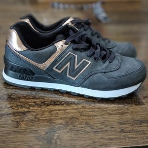 Gray and rose gold New Balance running shoes
